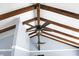Vaulted ceiling with exposed wooden beams, two ceiling fans, and modern lighting at 407 Hayne St, Walterboro, SC 29488