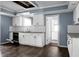 Kitchen with white cabinets, stainless steel appliances and a subway tile backsplash at 407 Hayne St, Walterboro, SC 29488