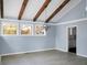 Living room featuring wood beams, a modern light fixture and lots of natural light at 407 Hayne St, Walterboro, SC 29488