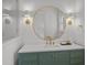 Bathroom vanity with a green cabinet, gold hardware, and a decorative gold-framed mirror at 499 Lackland Ct, Mount Pleasant, SC 29464