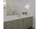 Close-up of modern bathroom vanity with white marble countertop and brass fixtures at 499 Lackland Ct, Mount Pleasant, SC 29464