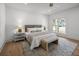 Bright bedroom with a ceiling fan, natural light and a neutral color scheme creating a cozy and inviting ambiance at 499 Lackland Ct, Mount Pleasant, SC 29464