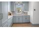 Charming kitchenette featuring blue cabinets, marble counters, and a bright window, perfect for a cozy space at 499 Lackland Ct, Mount Pleasant, SC 29464