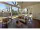 Inviting screened porch featuring comfortable seating and views of the backyard and surrounding greenery at 499 Lackland Ct, Mount Pleasant, SC 29464