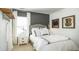 Bright bedroom with a bed, nightstands, and decor with grey headboard and furnishings at 546 Richfield Way, Summerville, SC 29486