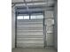 Picture of interior overhead roll up door with windows and standard side door at 567 Faison Rd # 7, Mount Pleasant, SC 29466