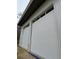 An image of the overhead roll up doors of storage units at the property at 567 Faison Rd # 7, Mount Pleasant, SC 29466