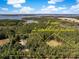 Aerial view of a property with 5 acres and 2 established pastures, as well as river access at 5991 Joseph Blake Ln, Wadmalaw Island, SC 29487