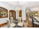 Cozy breakfast nook with hardwood floors and a chandelier at 5991 Joseph Blake Ln, Wadmalaw Island, SC 29487