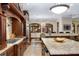 Gourmet kitchen with custom cabinetry, granite counters and stainless steel appliances at 5991 Joseph Blake Ln, Wadmalaw Island, SC 29487