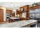 Spacious kitchen with a central island, custom cabinetry, and stainless steel appliances at 5991 Joseph Blake Ln, Wadmalaw Island, SC 29487