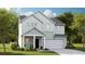 Charming two-story home featuring a covered entry, an attached two car garage, and professionally landscaped yard at 605 Red Monarch Way, Moncks Corner, SC 29461