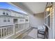 Cozy covered balcony with railing overlooking backyard, perfect for relaxing at 612 Mclernon Trce, Johns Island, SC 29455