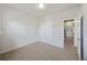 Bedroom with neutral walls, carpet, a ceiling light, a closet, and two doorways at 612 Mclernon Trce, Johns Island, SC 29455