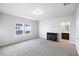 Bright bedroom boasts plush carpet, a large window, and ensuite bathroom at 612 Mclernon Trce, Johns Island, SC 29455