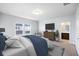 Spacious bedroom with closet, TV, and window view at 612 Mclernon Trce, Johns Island, SC 29455