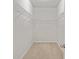 Walk-in closet with white wire shelving and neutral carpeting at 612 Mclernon Trce, Johns Island, SC 29455