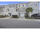Multi-story townhome with garage and manicured landscaping at 612 Mclernon Trce, Johns Island, SC 29455