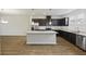 Contemporary kitchen featuring stainless steel appliances, granite countertops, and ample cabinet space at 612 Mclernon Trce, Johns Island, SC 29455