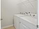 Laundry room with white washing machine and dryer at 612 Mclernon Trce, Johns Island, SC 29455