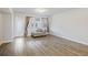 Bright living room featuring hardwood floors, neutral paint, and lots of natural light at 612 Mclernon Trce, Johns Island, SC 29455