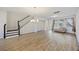 Spacious living room with hardwood floors, staircase and lots of natural light at 612 Mclernon Trce, Johns Island, SC 29455