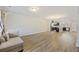 Open-concept living room and kitchen boasts modern appliances and hardwood floors at 612 Mclernon Trce, Johns Island, SC 29455