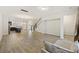 Spacious living room with open layout, flowing into the kitchen and dining areas, ideal for entertaining at 612 Mclernon Trce, Johns Island, SC 29455