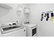Functional laundry room featuring modern washer and dryer units at 615 Red Monarch Way, Moncks Corner, SC 29461