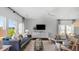 Cozy living space with comfortable seating, hardwood floors, and scenic views at 615 Red Monarch Way, Moncks Corner, SC 29461