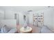 Organized playroom featuring a white shelving unit stocked with toys, perfect for children to relax and be entertained at 615 Red Monarch Way, Moncks Corner, SC 29461