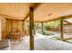Inviting outdoor space featuring bamboo accents, a seating area, and lush landscaping creating a serene retreat at 619 E Erie Ave, Folly Beach, SC 29439