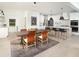 Bright, open-concept kitchen and dining area with modern appliances and light wood flooring at 641 Cottage Landing Dr, Summerville, SC 29485