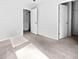 Bedroom featuring neutral paint, carpeted floors, and two closets at 669 Silver Spruce St, Summerville, SC 29486