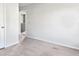 Bright bedroom with neutral carpet and a door to what appears to be an en-suite bathroom at 669 Silver Spruce St, Summerville, SC 29486