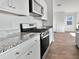 Well-appointed kitchen with stainless steel appliances, granite countertops, and ample storage at 669 Silver Spruce St, Summerville, SC 29486