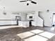 Spacious kitchen with a central island, stainless steel appliances, and modern lighting at 669 Silver Spruce St, Summerville, SC 29486