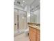 Bathroom features a glass-enclosed shower and granite vanity at 90 E Bay St, Charleston, SC 29401
