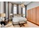 Spacious bedroom featuring large windows, bed and built-in storage at 90 E Bay St, Charleston, SC 29401