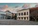 A stately building with classic architecture and cobblestone streets at 90 E Bay St, Charleston, SC 29401