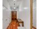 Long hallway with hardwood floors and ample storage space at 90 E Bay St, Charleston, SC 29401