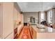 Sleek kitchen with modern appliances, granite counters, and ample cabinet space, flowing into the dining and living area at 90 E Bay St, Charleston, SC 29401
