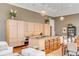 An open-concept living space with hardwood floors, a gourmet kitchen island, and natural light at 90 E Bay St, Charleston, SC 29401