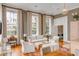 Bright and airy living room with hardwood floors, large windows, and a comfortable seating area perfect for entertaining at 90 E Bay St, Charleston, SC 29401