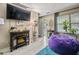 Comfortable living area with electric fireplace, decorative accents and lots of personality at 925 Dills Bluff Rd # 34, Charleston, SC 29412