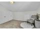 A cozy attic space features a comfortable chair, unique decor, and ample storage at 941 Law Ln, Mount Pleasant, SC 29464