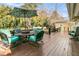 Outdoor back deck features a table, chairs, and umbrella perfect for outdoor relaxation and enjoyment at 941 Law Ln, Mount Pleasant, SC 29464