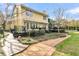 View of the backyard, featuring a spacious deck, stone pathway, and lush landscaping at 941 Law Ln, Mount Pleasant, SC 29464
