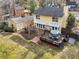 Aerial view of a home backyard with a wooden deck that has outdoor seating at 941 Law Ln, Mount Pleasant, SC 29464