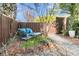 Cozy backyard seating area with outdoor furniture and lush greenery at 941 Law Ln, Mount Pleasant, SC 29464